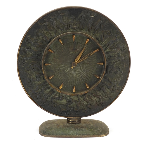 265 - German partially gilt cast iron mantle clock cast in relief with a continuous band of nude dancing f... 