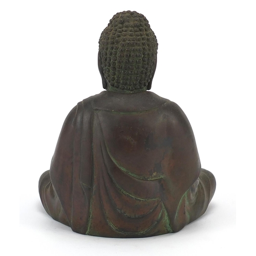 113 - Chino Tibetan patinated bronze figure of seated Buddha, 18cm high