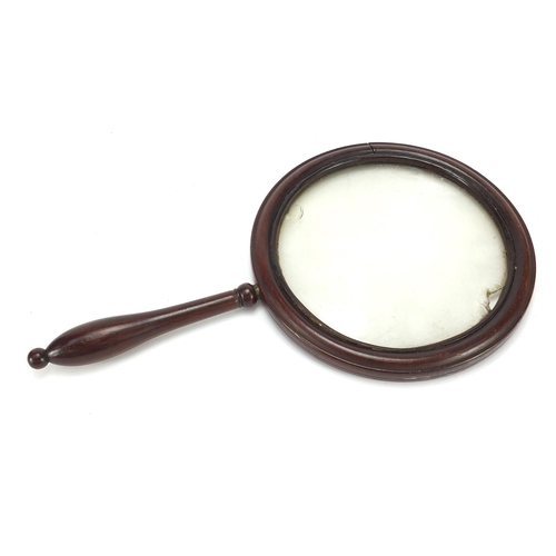 293 - Antique mahogany gallery magnifying glass with turned handle, 32.5cm in length