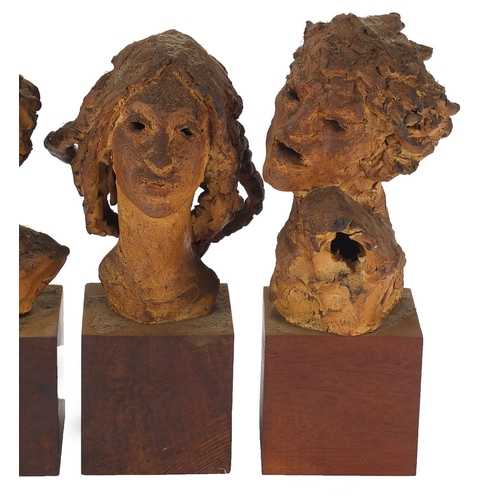 392 - Three mid century pottery busts raised on wooden block bases, each inscribed Elizabeth Benenson to t... 