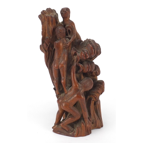 241 - Antique treen carving of figures climbing a tree, 19.5cm high