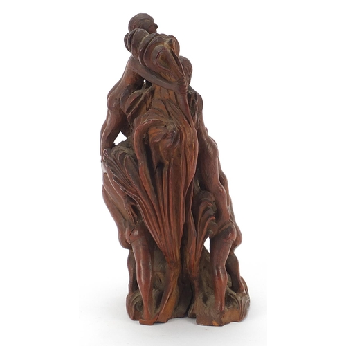 241 - Antique treen carving of figures climbing a tree, 19.5cm high
