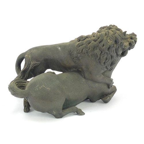 222 - Antique patinated bronze group of a lion attacking a horse, 18cm wide