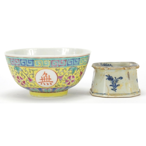17 - Chinese porcelain comprising a Canton wrist rest, blue and white salt and a famille rose bowl, the l... 