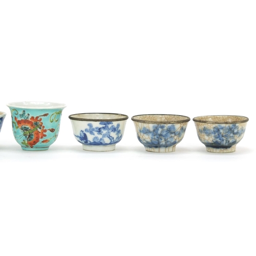 13 - Seven Chinese porcelain tea bowls, including four blue and white examples, the largest 3.5cm high