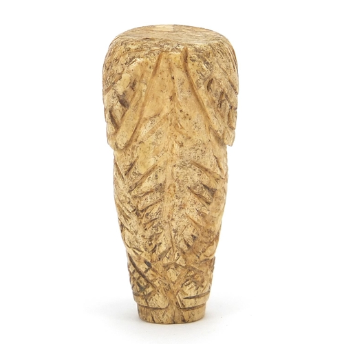 178 - Anglo Saxon carved bone aestal in the form of a man's head, 4cm high