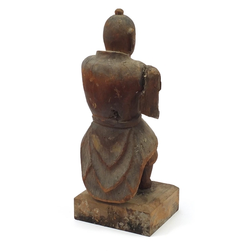 243 - Antique wood carving of a robed man, 45cm high