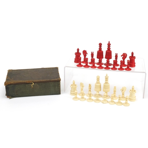 332 - Half stained carved bone chess set, the largest piece 9.5cm high