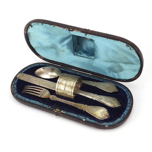 2425 - Victorian silver four piece christening set comprising knife, fork, spoon and napkin ring housed in ... 