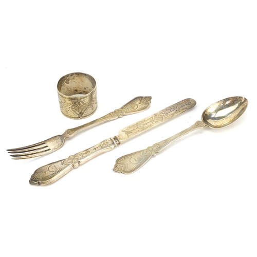 2425 - Victorian silver four piece christening set comprising knife, fork, spoon and napkin ring housed in ... 