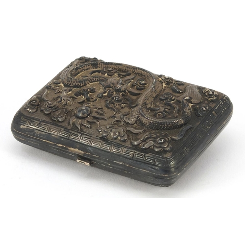 68 - Chinese unmarked silver cigarette case embossed with warriors on horseback and a dragon chasing a fl... 