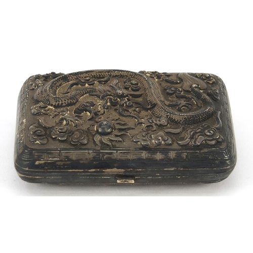 68 - Chinese unmarked silver cigarette case embossed with warriors on horseback and a dragon chasing a fl... 