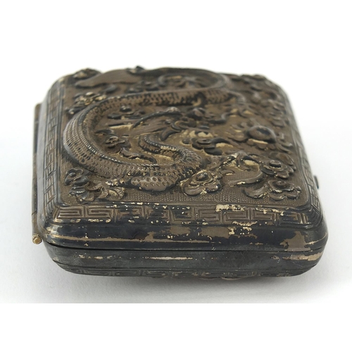 68 - Chinese unmarked silver cigarette case embossed with warriors on horseback and a dragon chasing a fl... 