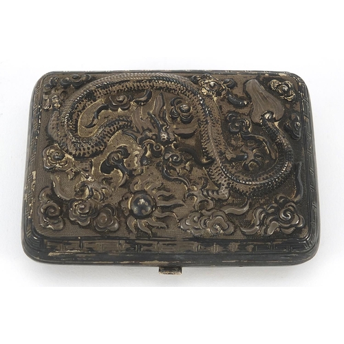 68 - Chinese unmarked silver cigarette case embossed with warriors on horseback and a dragon chasing a fl... 