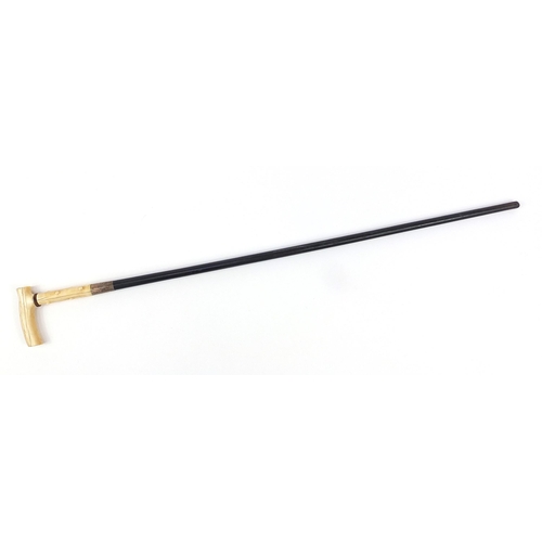 320 - Ebonised walking stick with ivory handle and silver collar concealing a corkscrew, 87cm in length