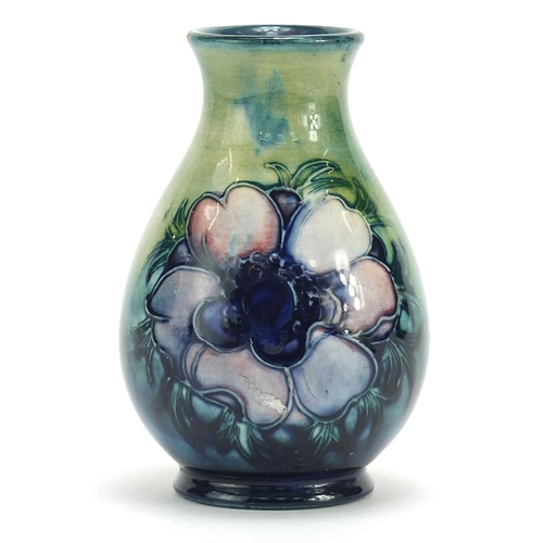 398 - Moorcroft baluster vase hand painted with two flower heads, impressed marks to the base, 10.5cm high