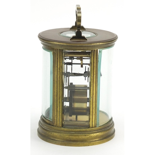 267 - 19th century French circular brass carriage clock with bevelled glass and enamelled dial having Roma... 