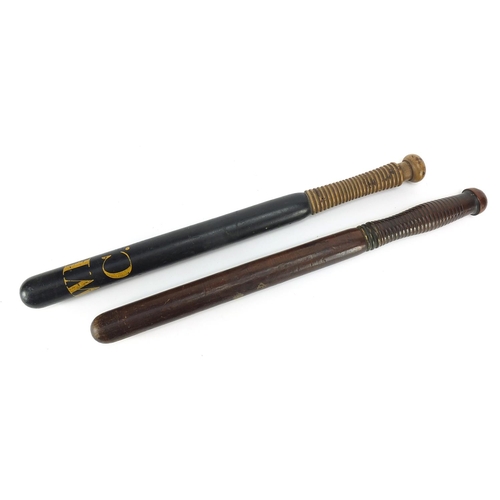 278 - Two antique police truncheons comprising one with rotating handle and one with painted initials WPC,... 