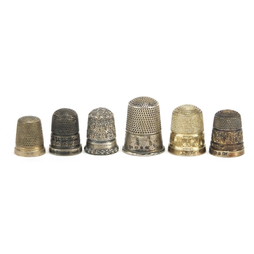 2418 - Six silver thimbles, various hallmarks including Charles Horner, the largest 2.7cm high, total 23.0g