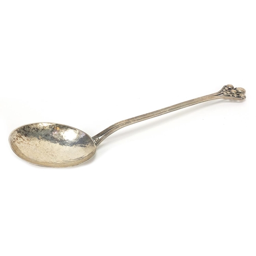 2330 - Large Arts & Crafts unmarked silver spoon with planished bowl and stylised terminal, 28cm in length,... 
