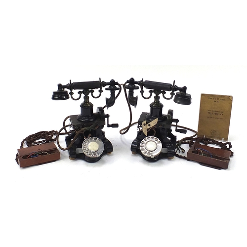 269 - Two early 20th century Ericsson no 16 dial telephones and a Elements of Telephony book, each telepho... 