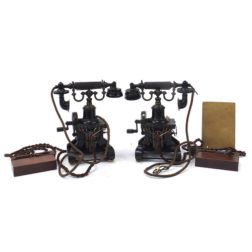 269 - Two early 20th century Ericsson no 16 dial telephones and a Elements of Telephony book, each telepho... 