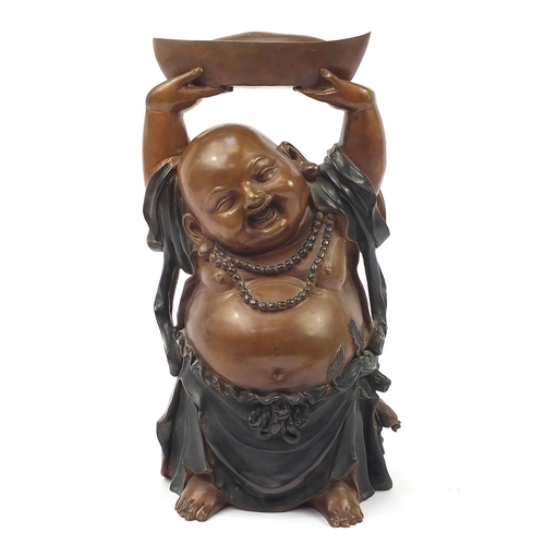 117A - Large Chinese patinated bronze figure of Buddha with his hands above his head holding a vessel, 48cm... 