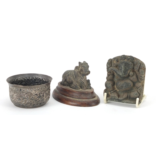 198 - Indian objects to include a white metal bowl, white metal bull on wooden plinth and carved hardstone... 