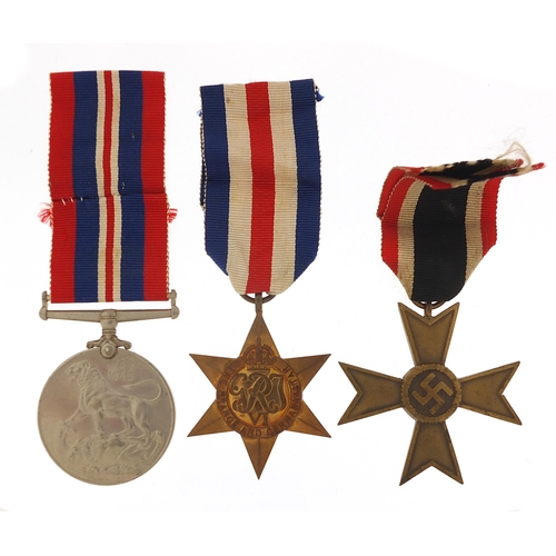 2440 - Two British military World War II medals and a German example