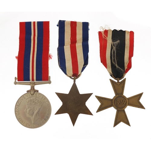 2440 - Two British military World War II medals and a German example