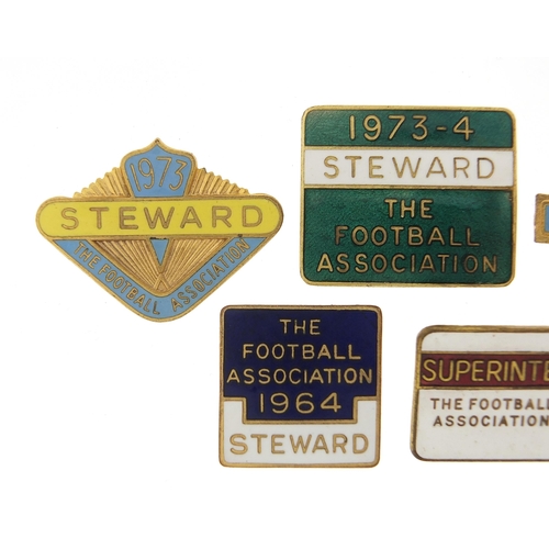 2478 - Five 1960's and later Football Association Steward and Superintendent badges