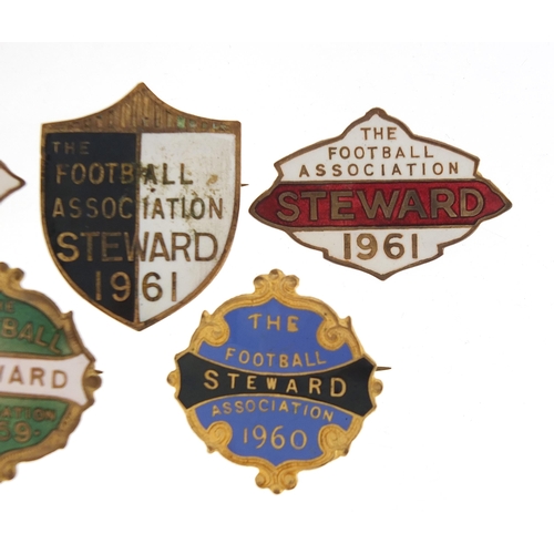 2474 - Five 1950's and later Football Association Steward badges