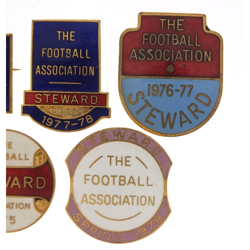 2473 - Five 1970's Football Association Steward badges