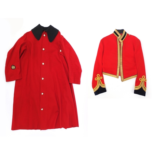 2460A - Military interest Red Life Guard's long coat with a Regimental Sergeant Major badge on the right sle... 