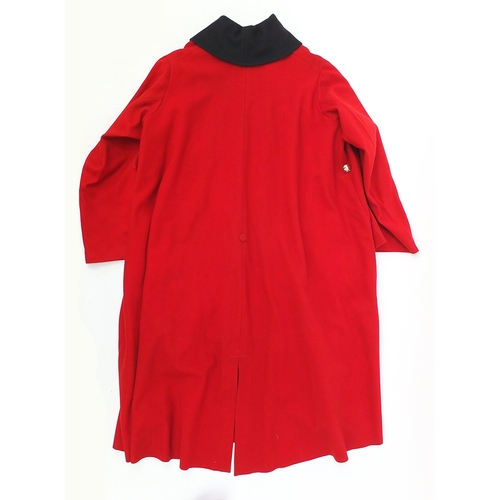 2460A - Military interest Red Life Guard's long coat with a Regimental Sergeant Major badge on the right sle... 