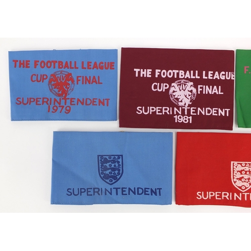 2481 - Five vintage Football Association Superintendent and Steward arm bands including 1979 Football leagu... 