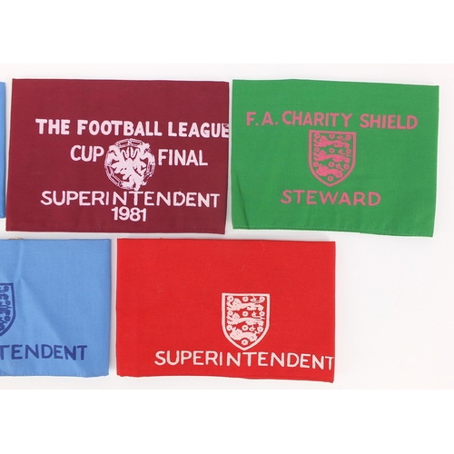 2481 - Five vintage Football Association Superintendent and Steward arm bands including 1979 Football leagu... 