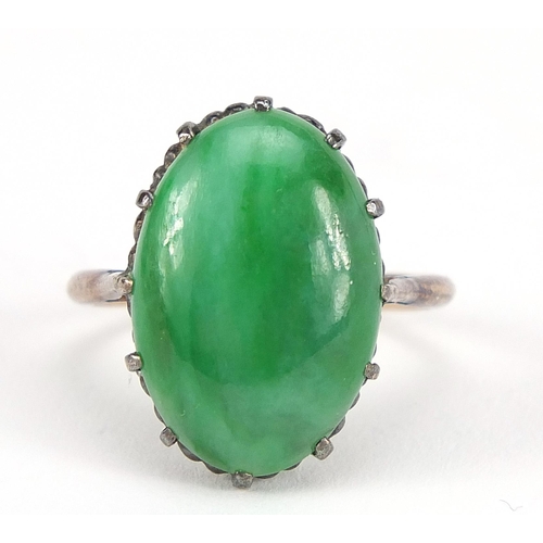 1669 - Chinese unmarked gold cabochon green jade ring, size J, 4.2g