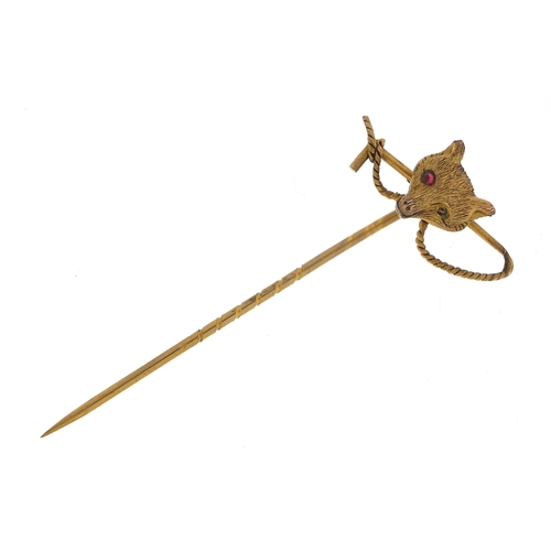 1762 - Victorian unmarked gold fox head and riding crop stick pin, 5.5cm in length, 1.4g