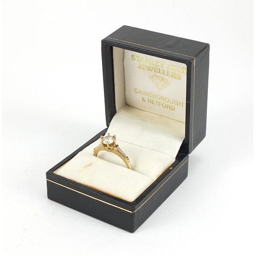 1761 - 9ct gold cubic zirconia solitaire ring, size R, 2.3g