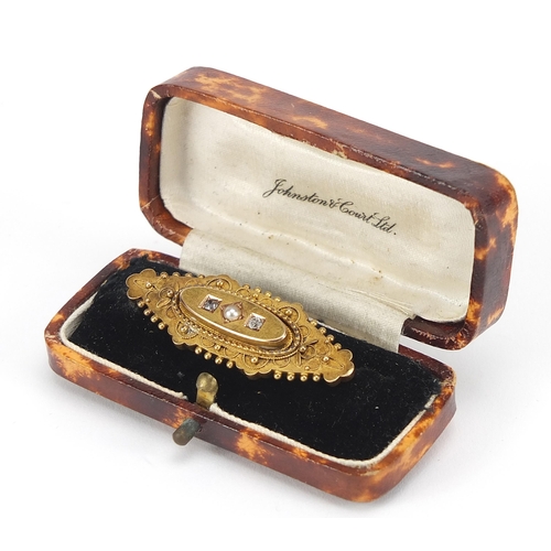 1764 - Victorian 15ct gold diamond and seed pearl bar brooch, housed in a Johnston & Court box, 4.5cm wide,... 