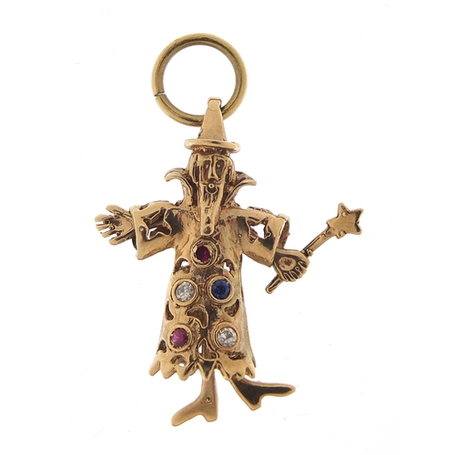 1752 - 9ct gold multi gem wizard pendant with moving hands and feet, 3.5cm high, 3.5g