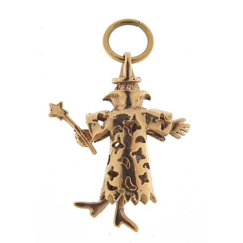 1752 - 9ct gold multi gem wizard pendant with moving hands and feet, 3.5cm high, 3.5g