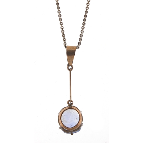 1776 - 9ct gold sapphire pendant, 3.2cm high on a silver necklace, 2.8g