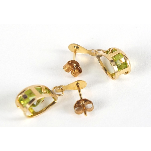 1770 - Pair of 9ct gold peridot tear drop earrings, housed in a Alex Perry box, 1.8cm high, 1.0g