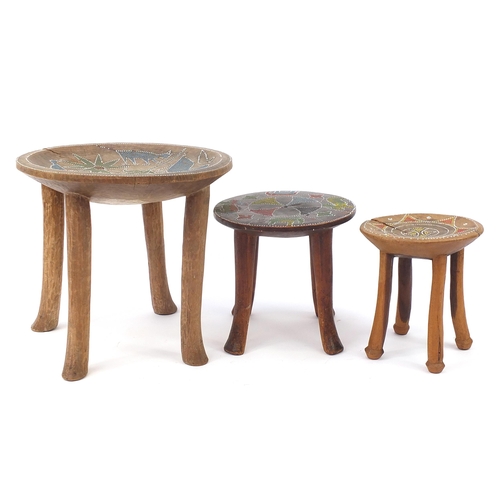 189 - Three African hardwood stools with beadwork inlay decorated with animals and flowers, the largest 28... 