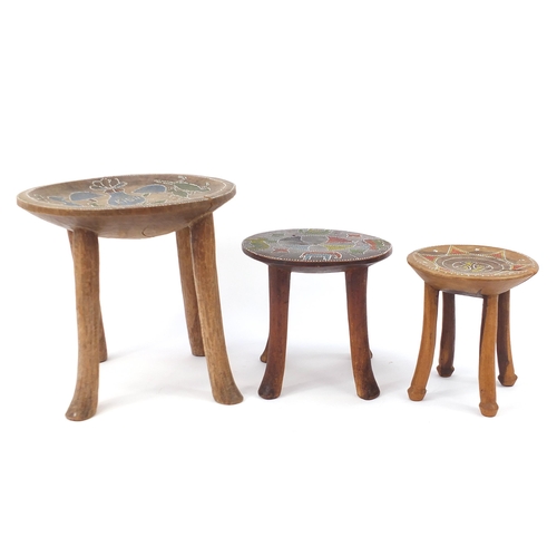 189 - Three African hardwood stools with beadwork inlay decorated with animals and flowers, the largest 28... 