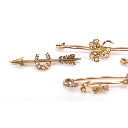 1736 - Four 9ct gold seed pearl bar brooches including a horseshoe, butterfly and shamrock, the largest 4.4... 