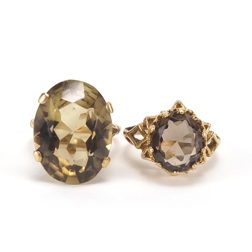 1735 - Two 9ct gold rings set with citrine and smoky quartz, sizes L and M, 10.8g