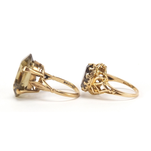 1735 - Two 9ct gold rings set with citrine and smoky quartz, sizes L and M, 10.8g